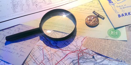 Magnifying glass and old documents